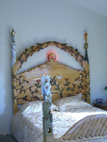 Hand carved bed with angels on it. Fantasy Furniture, wood carving, angels, art, custom furniture