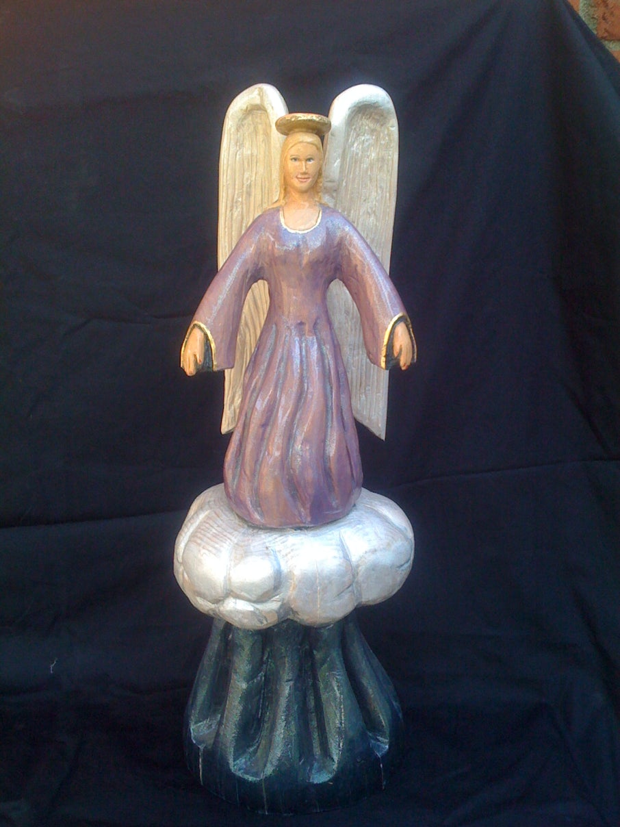 Wood carving of an angel, sculpture of an angel, art