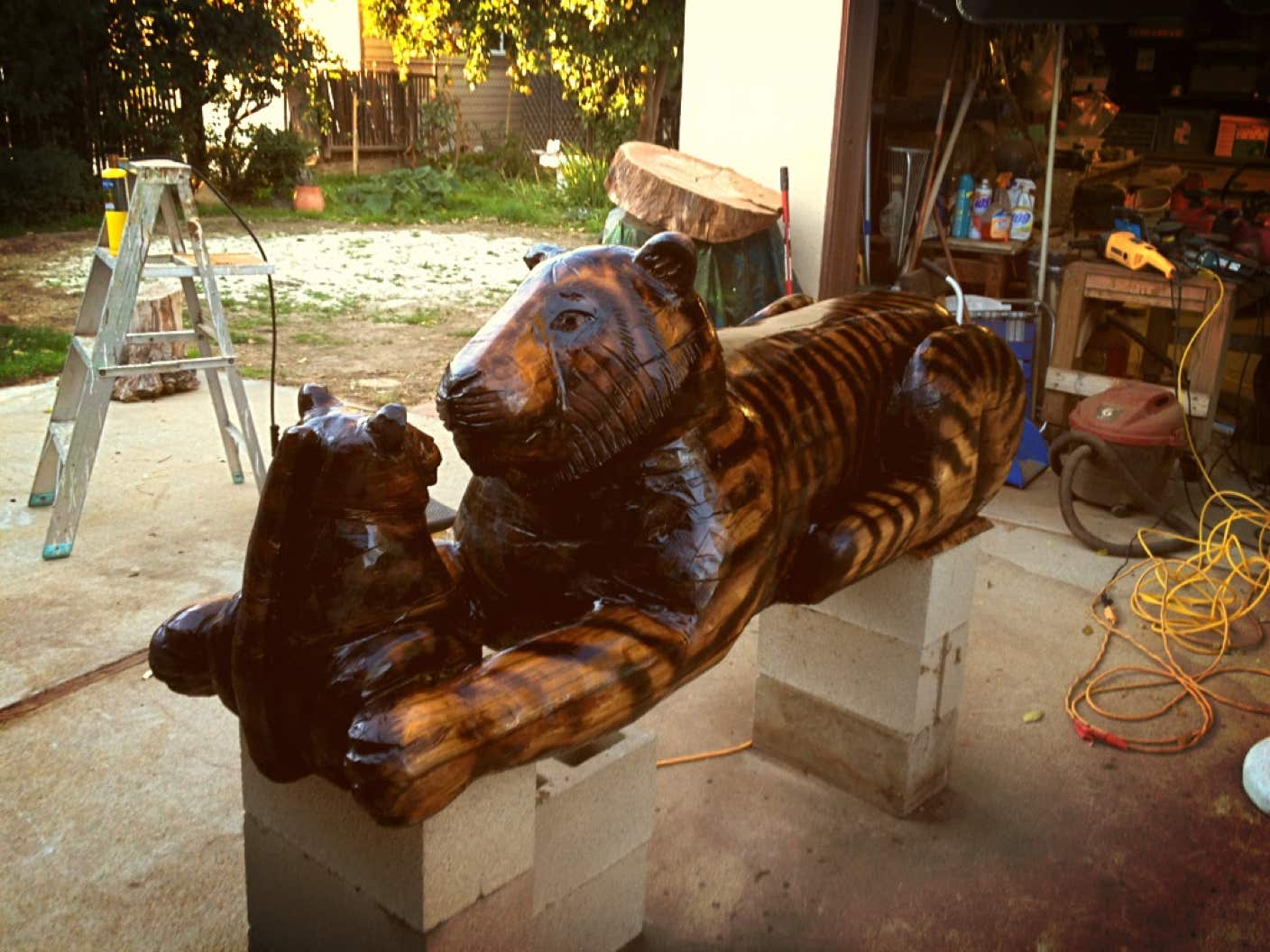 Woodcarving of a tiger, sculpture of a tiger, tiger carving