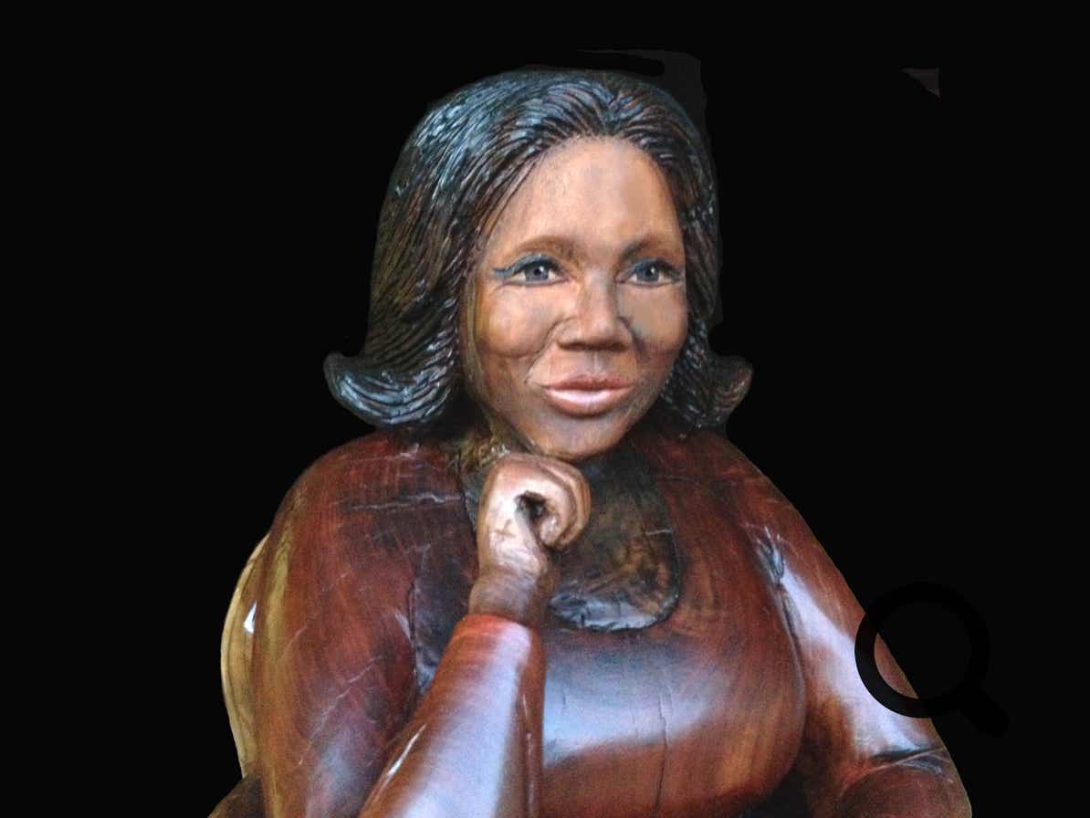 Detail photo of life size wood carving sculpture of Oprah Winfrey, art, likeness