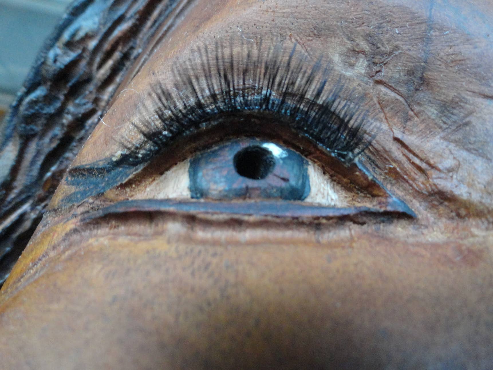 eyelashes Detail photo of life size wood carving sculpture of Oprah Winfrey, art, likeness
