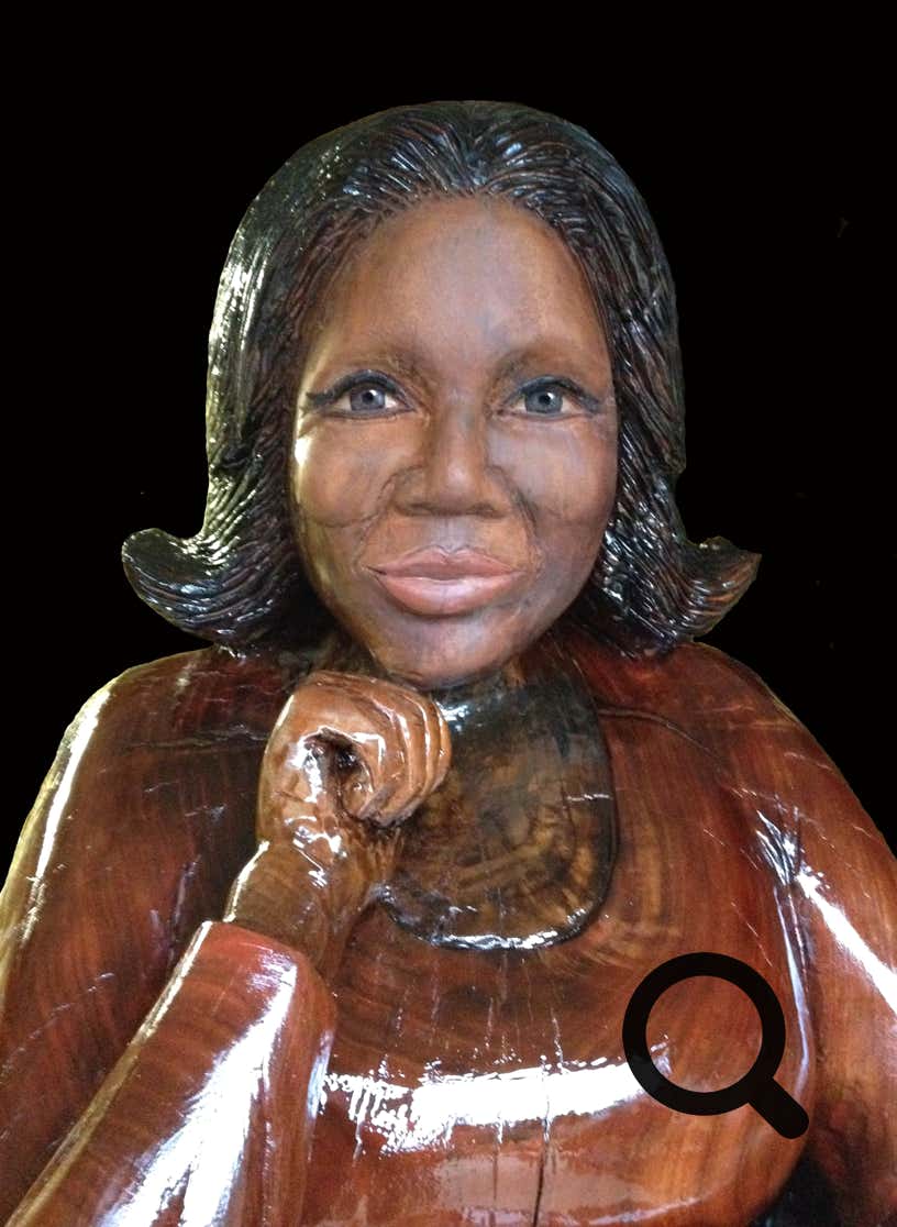 Detail photo of life size wood carving sculpture of Oprah Winfrey, art, likeness