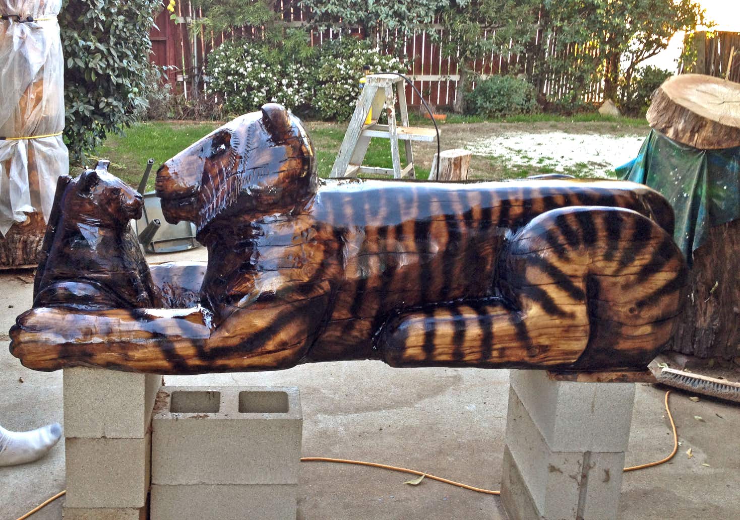 Woodcarving of a tiger, sculpture of a tiger, tiger carving