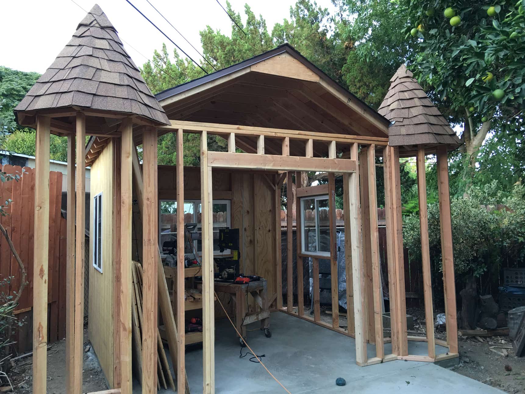 Castle, Mini-Castle, She-Shed, Dream Castle, Fantasy Castle, Art Studio Castle, man cave, cement art, stucco, cement, stone, angel, butterfly, lion, shamrock, heart, cherub, muse, Stardust Castle, leaf face, wood spirit, hand, 